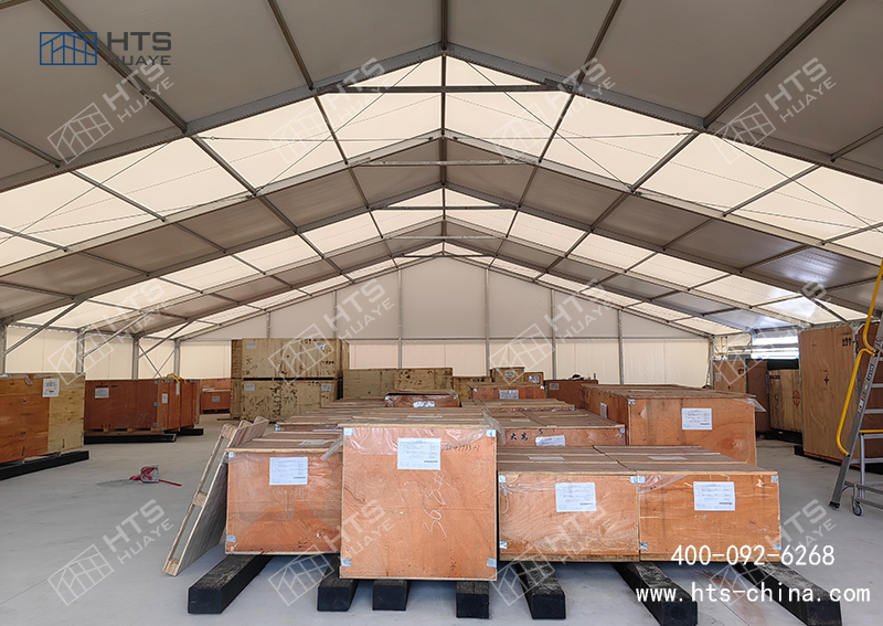 仓库满了不用慌，只有厂区有空位用组装篷房仓库短期急剧搭建使用